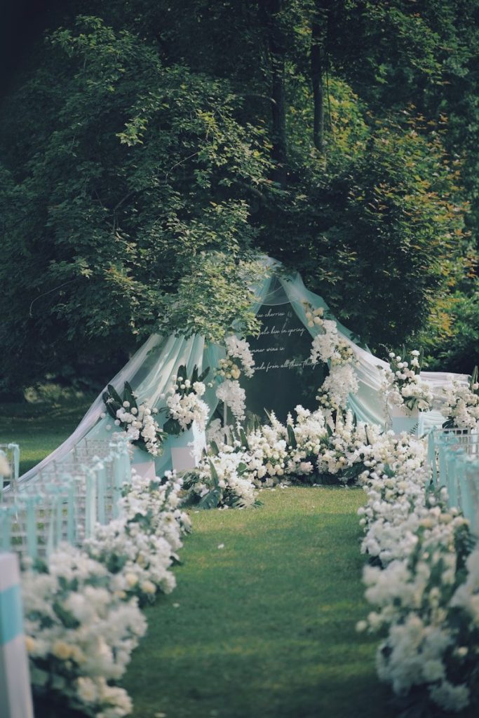 white concrete building near green grass field during daytime